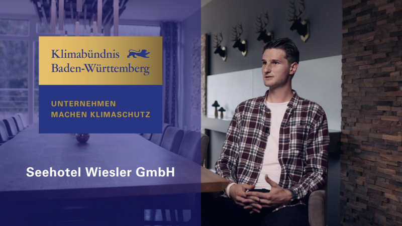 Links das Logo in gold und blau "Klimabündnis Baden-Württemberg, Unternehmen machen Klimaschutz" mit der Aufschrift Seehotel Wiesler GmbH. Rechts Fabian Isle.